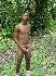 latin-twink-strips-poses-outdoors